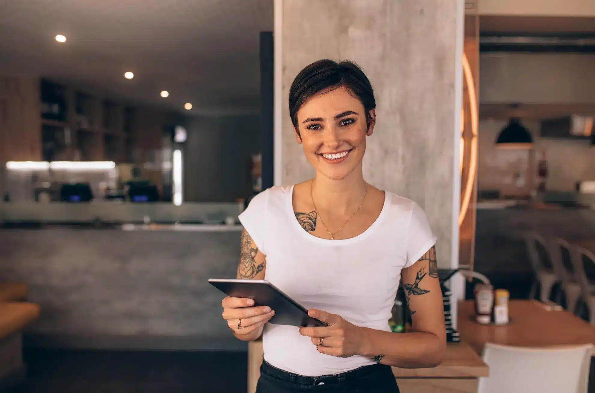 Quantum ePay - Female Server Working in a Restaurant